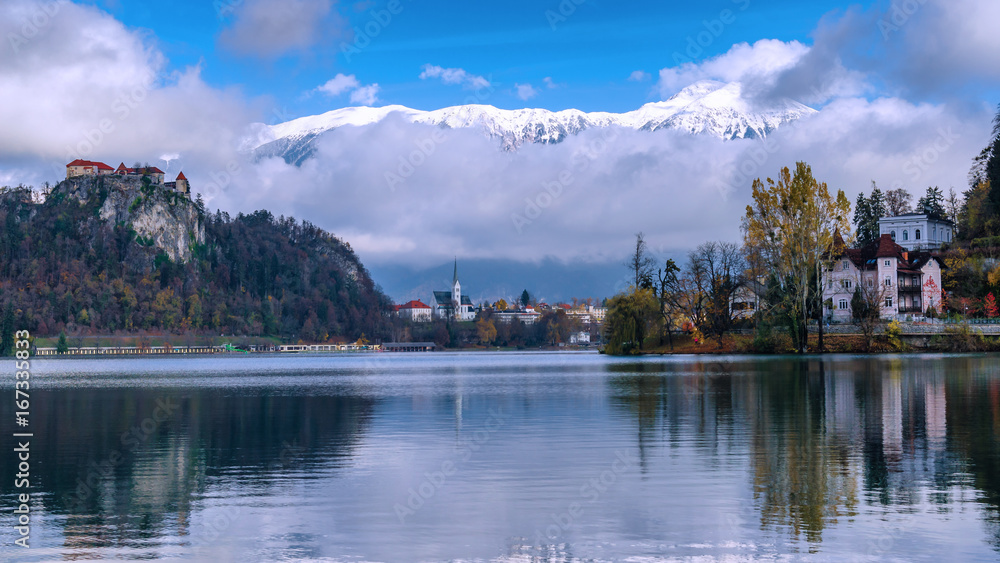 Bled lake with castle, Bled city and mountains on the background