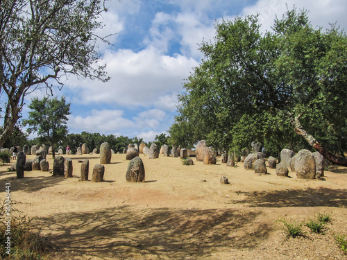 A view of the menhirs at Cromeleque dos Almendres (Almendres Cromlech) megalithic complex in Portugal