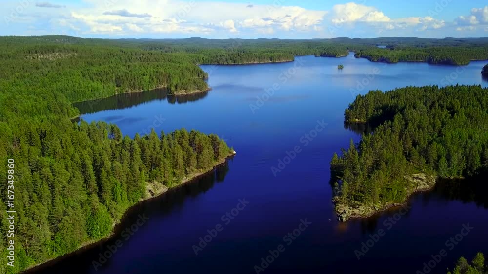 Aerial shot of beautiful islands at lake on a calm summer day. 4K video. Aerial shot of beautiful islands at lake on a calm summer day. 4K video.