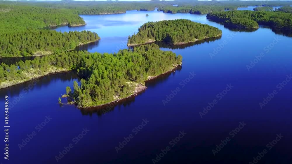 Aerial shot of beautiful islands at lake on a calm summer day. 4K video. Aerial shot of beautiful islands at lake on a calm summer day. 4K video.