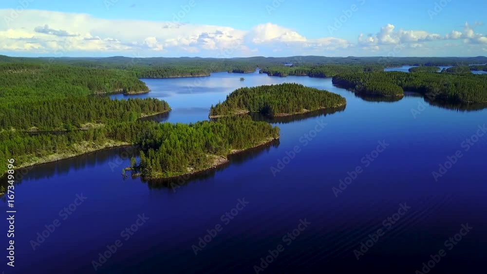 Aerial shot of beautiful islands at lake on a calm summer day. 4K video. Aerial shot of beautiful islands at lake on a calm summer day. 4K video.