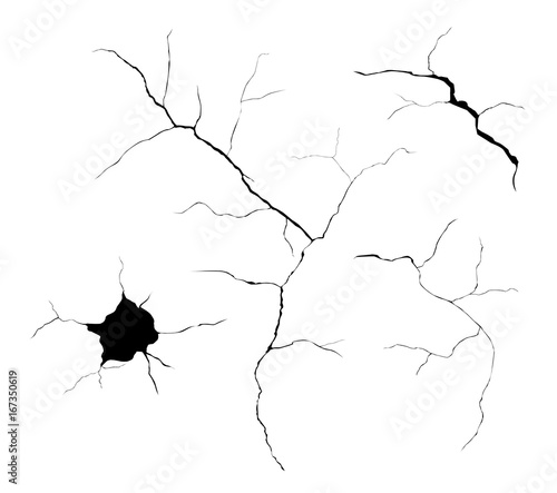Set of black vector cracks and holes isolated on white background photo