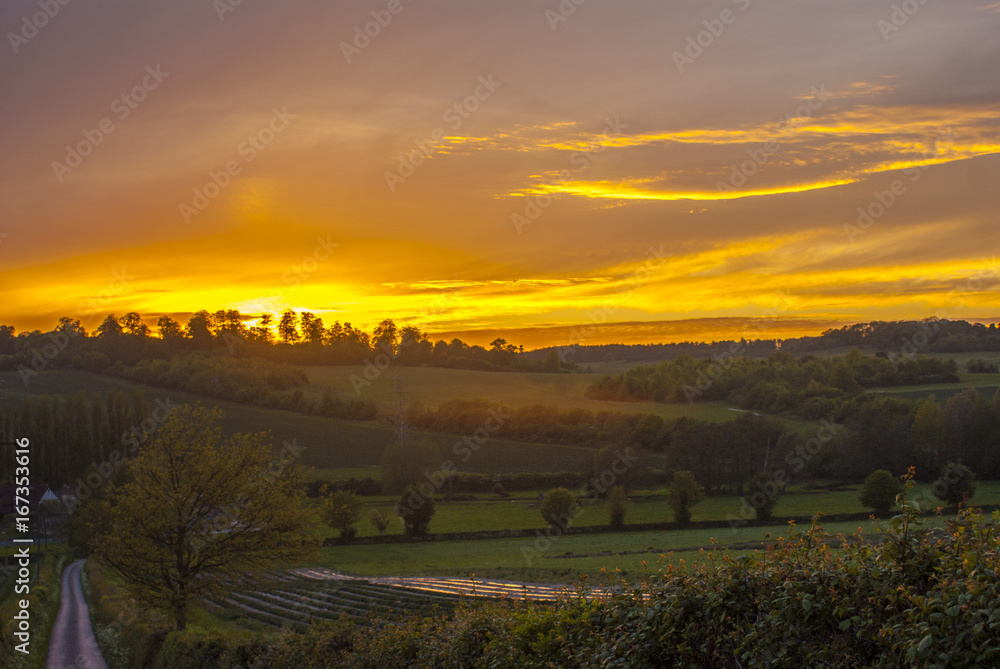 Sunset Over a Country Farm