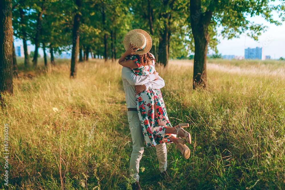 Happy valentines love story concept of a romantic couple against chalk  drawings background. Male pole dancing on a lamppost while walking with  girlfriend Stock Photo - Alamy