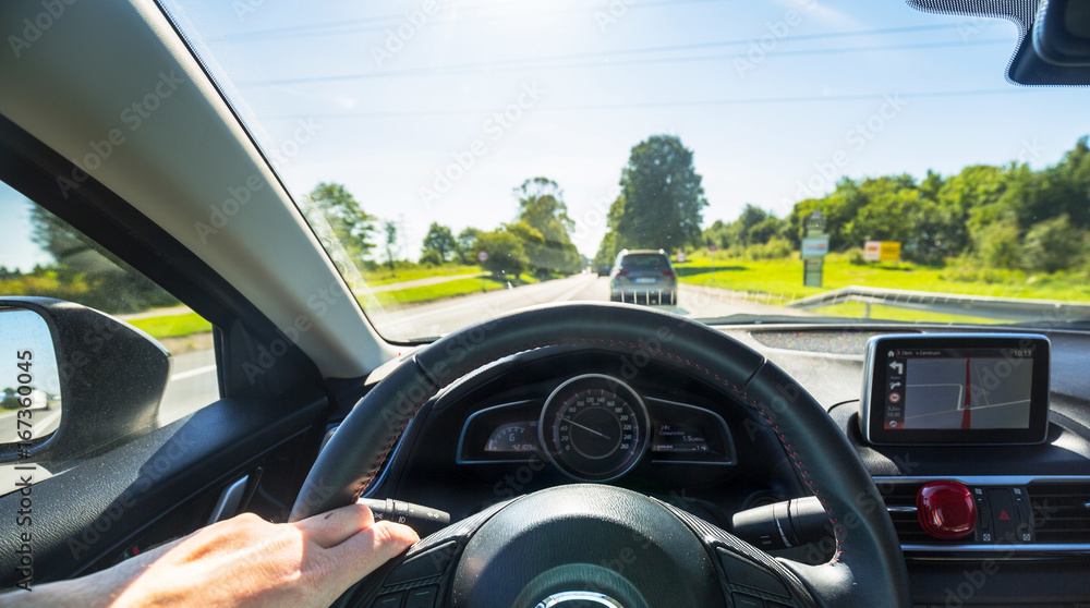 Steering wheel of a car at drive