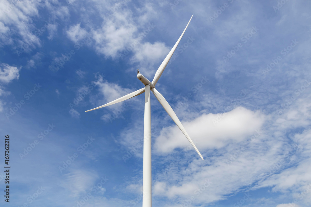 wind turbine generating electricity producing alternative energy with blue sky background wind turbine generating electricity producing alternative energy with blue sky background