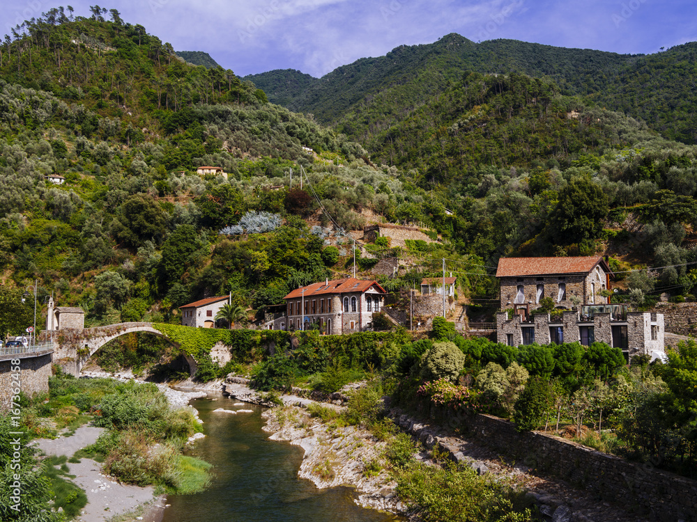 Bridge and river in Badalucco Italy