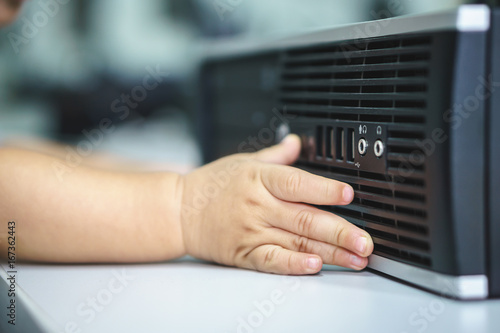 Wallpaper Mural An Asian baby trying to use desktop computer Torontodigital.ca