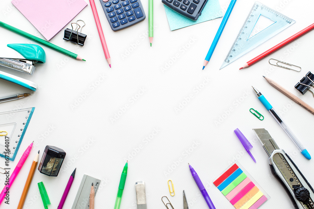 Set of stationery on white table, top view. School Concept Set of stationery on white table, top view. School Concept