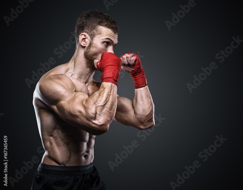 MMA Fighter Preparing Bandages For Training. © Restyler