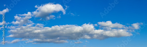 Blue sunny sky with white clouds landscape banner, huge panorama © rustamank