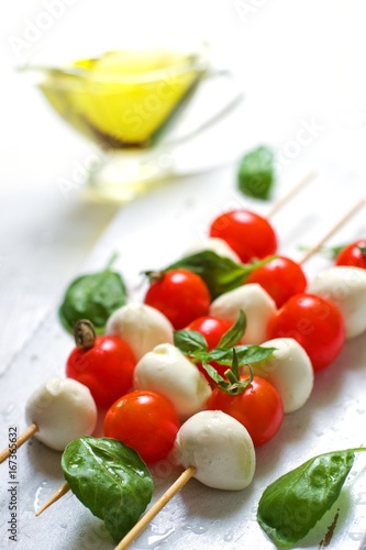 Mozzarella, cherry tomatoes and basil 