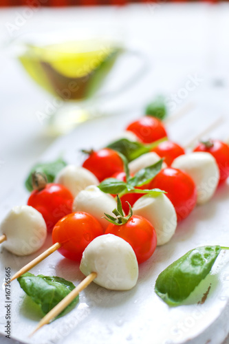Mozzarella, cherry tomatoes and basil 
