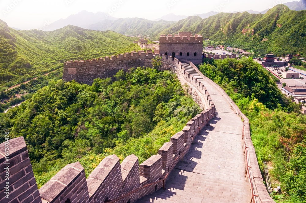 Scenic view of Great wall of China during sunny day Scenic view of Great wall of China during sunny day