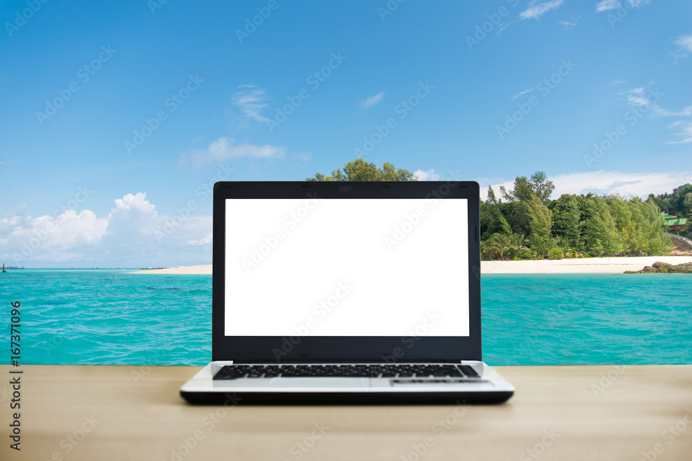 Laptop with tropical island