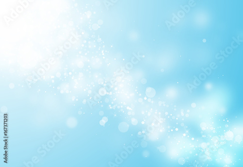 Blue glitter sparkles rays lights bokeh Festive Christmas Elegant abstract background.