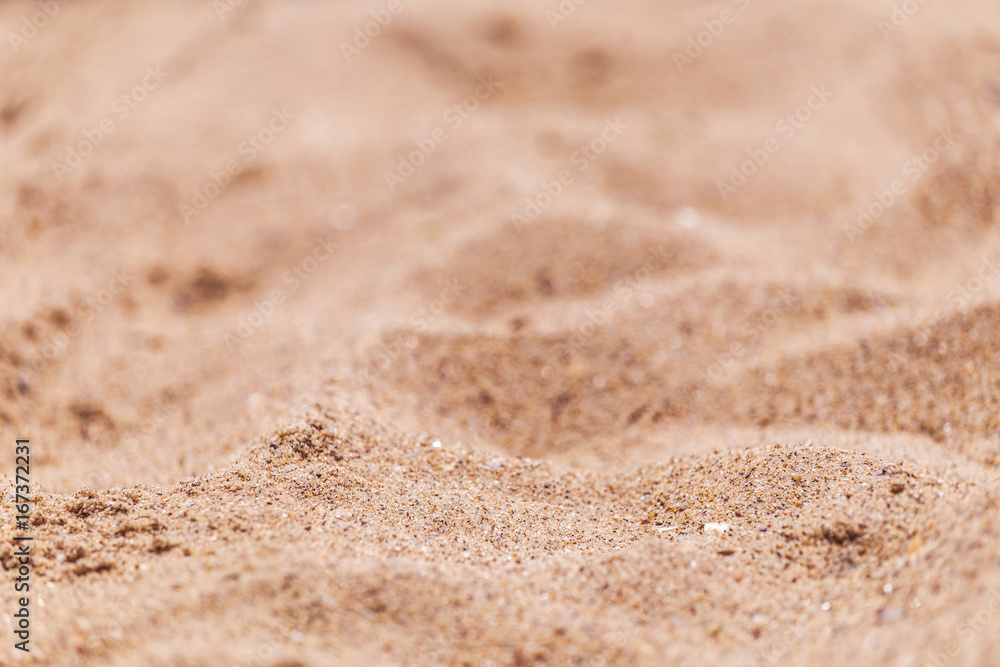 Sand on the beach as background with space for the text. Sea travel and holiday. Selective focus Sand on the beach as background with space for the text. Sea travel and holiday. Selective focus