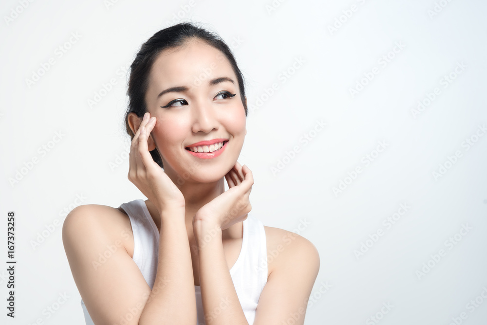 Asian woman with beautiful skinface non make up,pure cosmetic isolated on white background Asian woman with beautiful skinface non make up,pure cosmetic isolated on white background