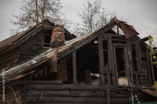 Abandoned wooden house after fire © movieaboutyou