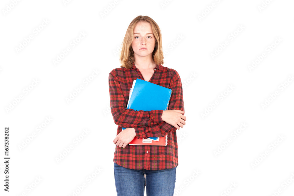 Portrait of beautiful female college student with notebooks against white background Portrait of beautiful female college student with notebooks against white background