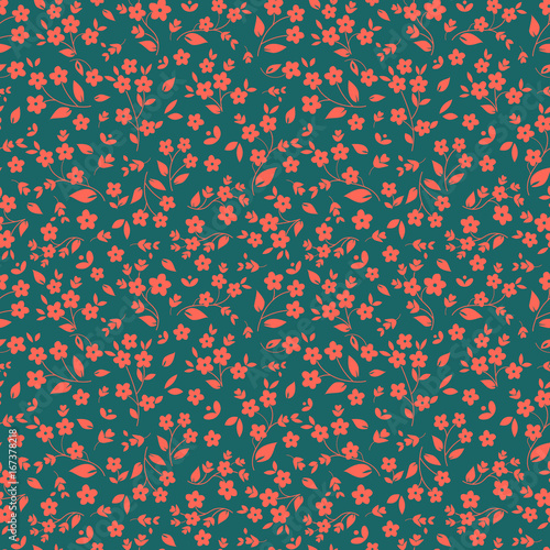 Seamless floral vector pattern orange pinkish small flowers on dark green background, ditzy, millefleaurs, fabric, tapestry, quilting