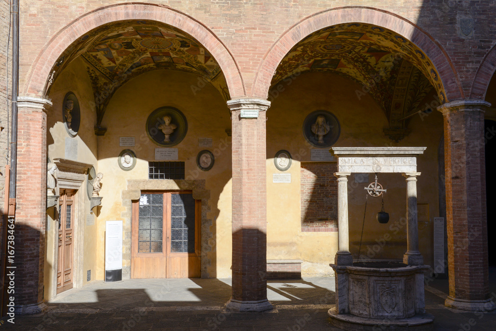 Arches of Chigi Saracini palace at Siena