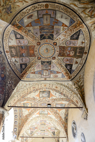 Frescos on arches of Chigi Saracini palace at Siena photo