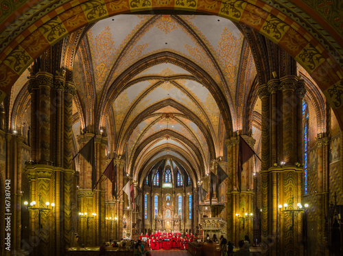 Interior of Matthias Church with choir singing