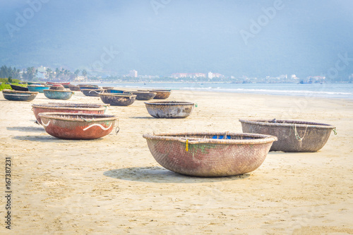 Group of coracles in the beach
