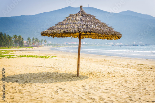 Straw umbrella in the beach