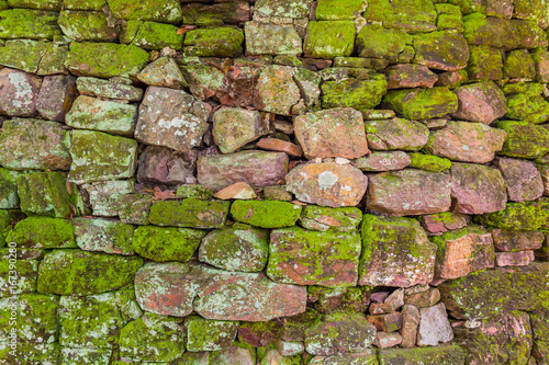 Wonder wall moss on old stone photo