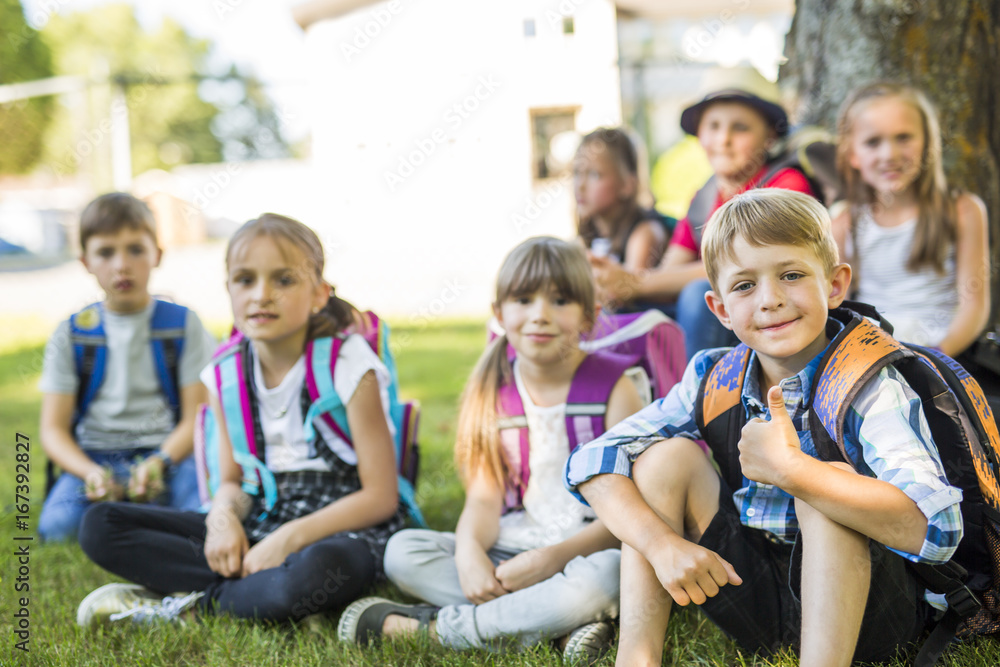 Portrait Of School Pupils Outside Classroom Carrying Bags Portrait Of School Pupils Outside Classroom Carrying Bags