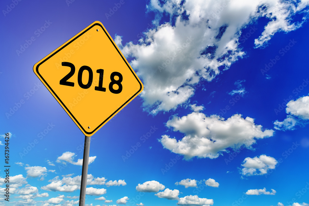 Naklejka premium Blue cloudy sky and yellow road sign