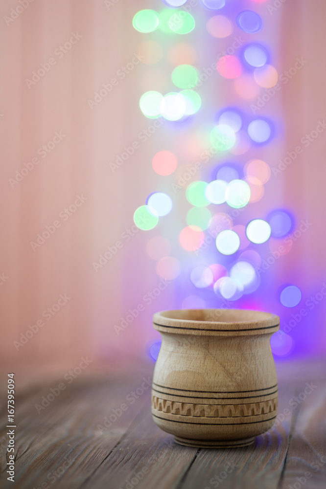 Wooden jar on boken background. Magic jar Wooden jar on boken background. Magic jar