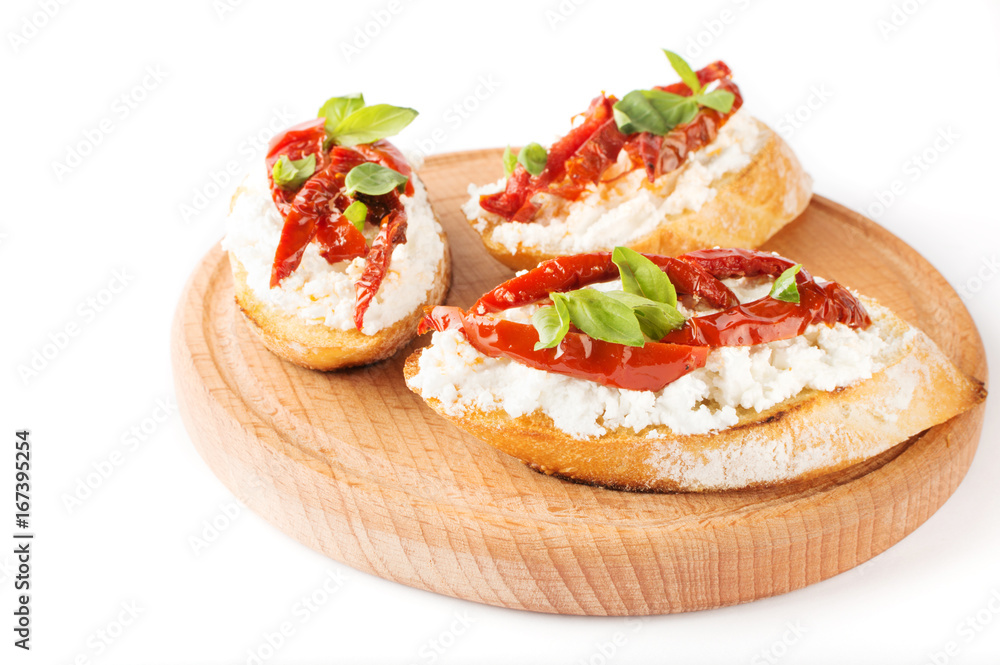 Italian sandwiches - bruschetta with cheese, tomato and basil