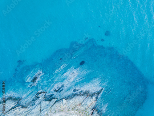 Aerial view of the tropical sea and the rock