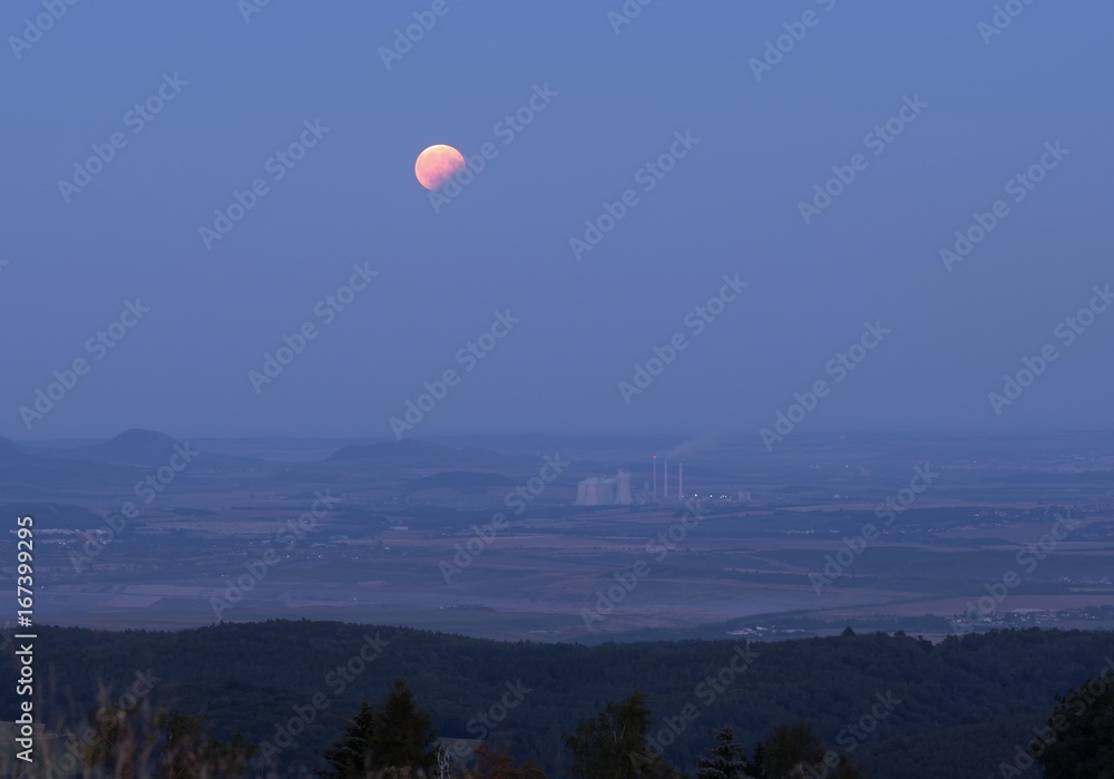 Partial lunar eclipse of the power plant in the Czech Central Mountains.