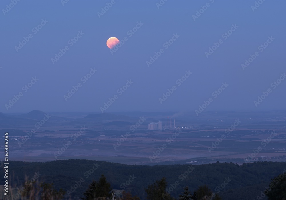 Partial lunar eclipse of the power plant in the Czech Central Mountains. Partial lunar eclipse of the power plant in the Czech Central Mountains.