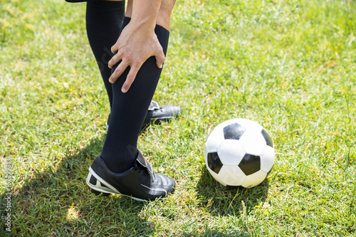 Male Soccer Player Suffering From Lower Leg Injury