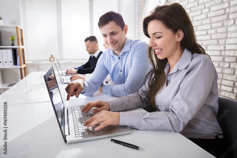 Businessman Working With Colleagues Businessman Working With Colleagues