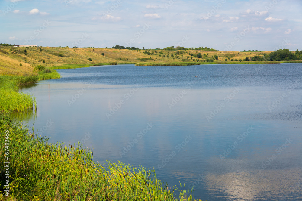 Summer landscape with lake in central Russia. Front focus Summer landscape with lake in central Russia. Front focus