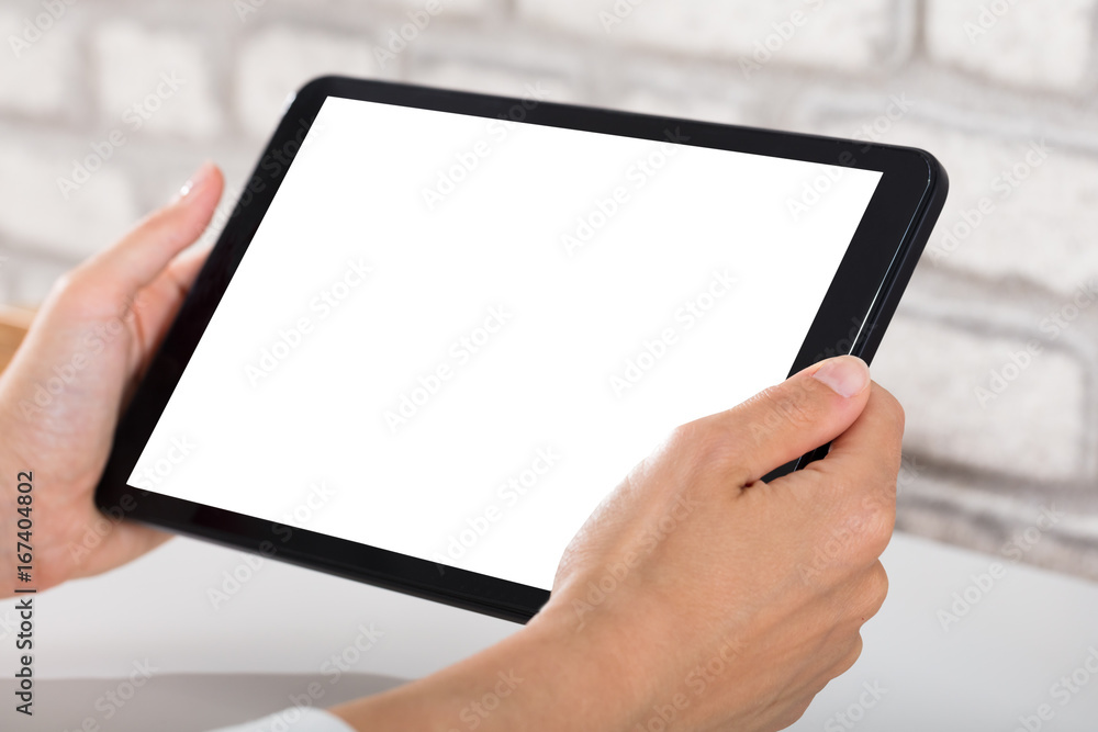 Close-up Of A Person Using Digital Tablet Close-up Of A Person Using Digital Tablet