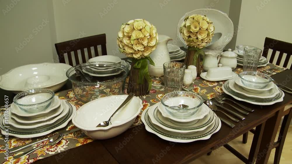 Full dining set on table, tilt down Full dining set on table, tilt down