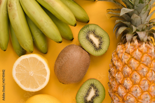 Set of fruits on a yellow background