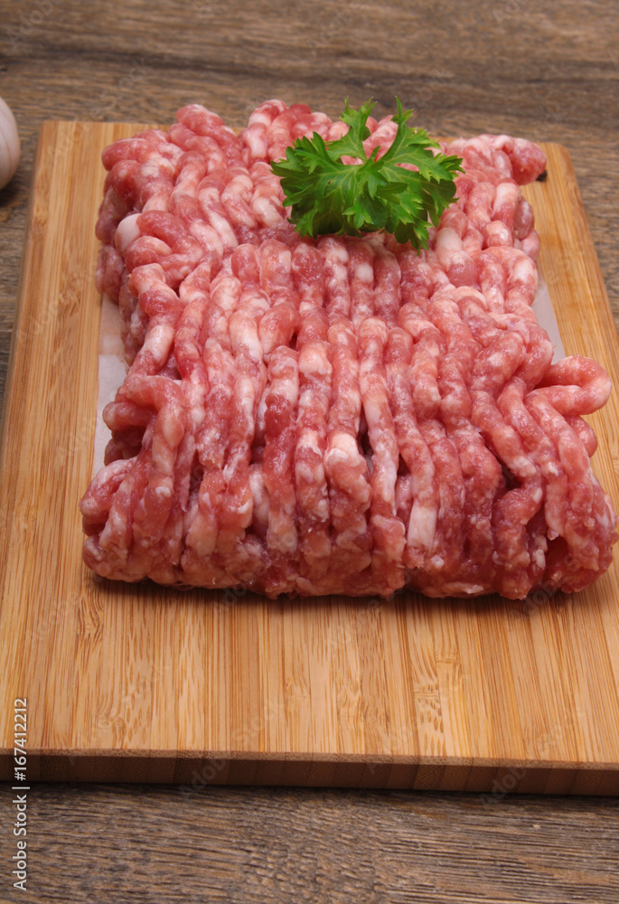 Raw minced meat with pepper, garlic