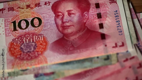 Hands counting cash - Chinese RMB, - Yuan paper notes; close-up