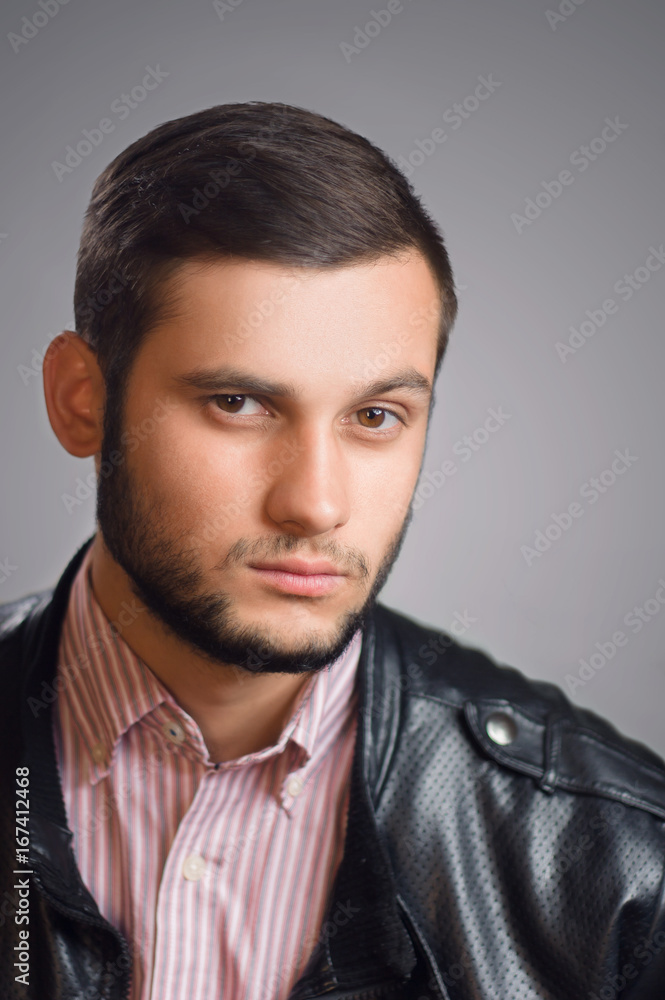 Obraz premium Casual young man studio portrait