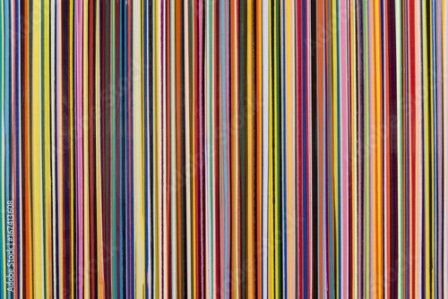Vertical stripes of various colors thin width with texture. photo