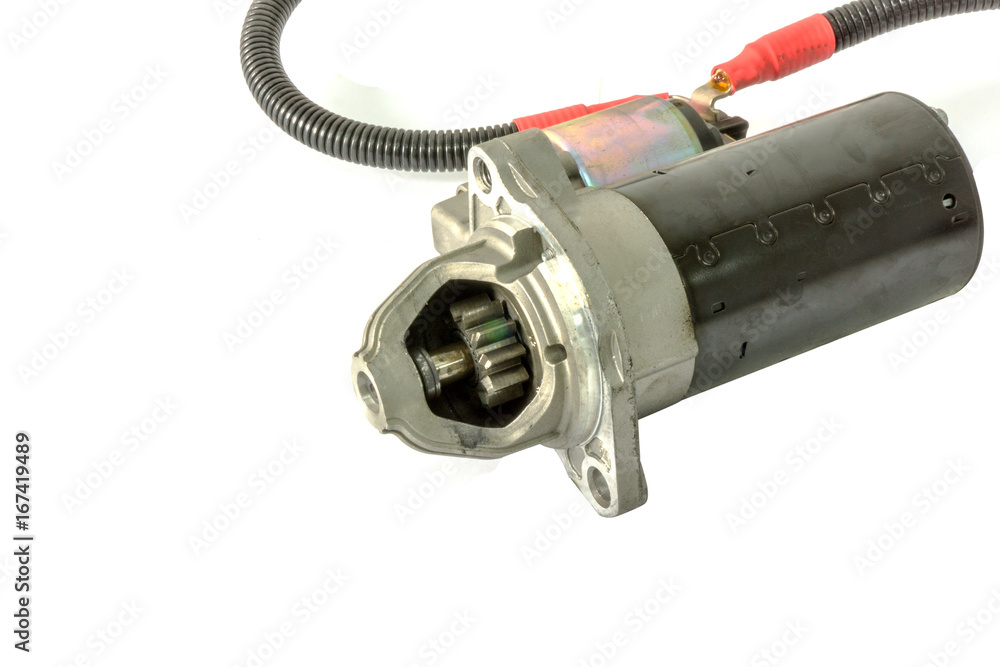 Electric Starter for a car and solenoid with wire cables isolated on white background. Car spare parts. Electric Starter for a car and solenoid with wire cables isolated on white background. Car spare parts.
