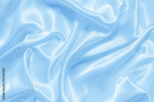Smooth elegant blue silk or satin can use as background